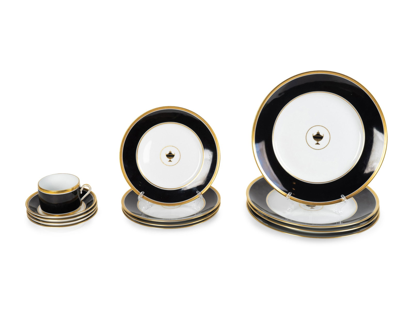 A Richard Ginori Porcelain Part Dinner Service: A Richard Ginori Porcelain Part Dinner Service 20TH CENTURY in the Contessa Onice pattern, comprising: 12 dinner plates 12 salad plates 8 coffee cups 8 saucers (40 pieces) The Estate of Richard 