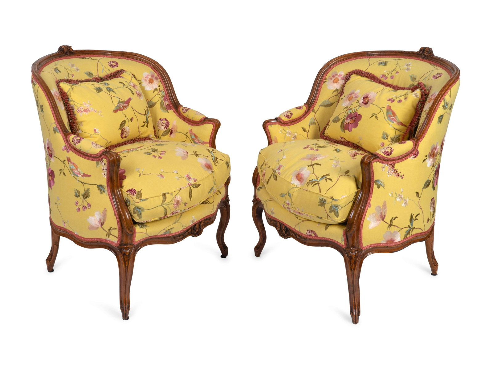 A Pair of Louis XV Style Carved Mahogany Bergeres : A Pair of Louis XV Style Carved Mahogany Bergeres 20TH CENTURY Yellow floral upholstery. Height 34 inches