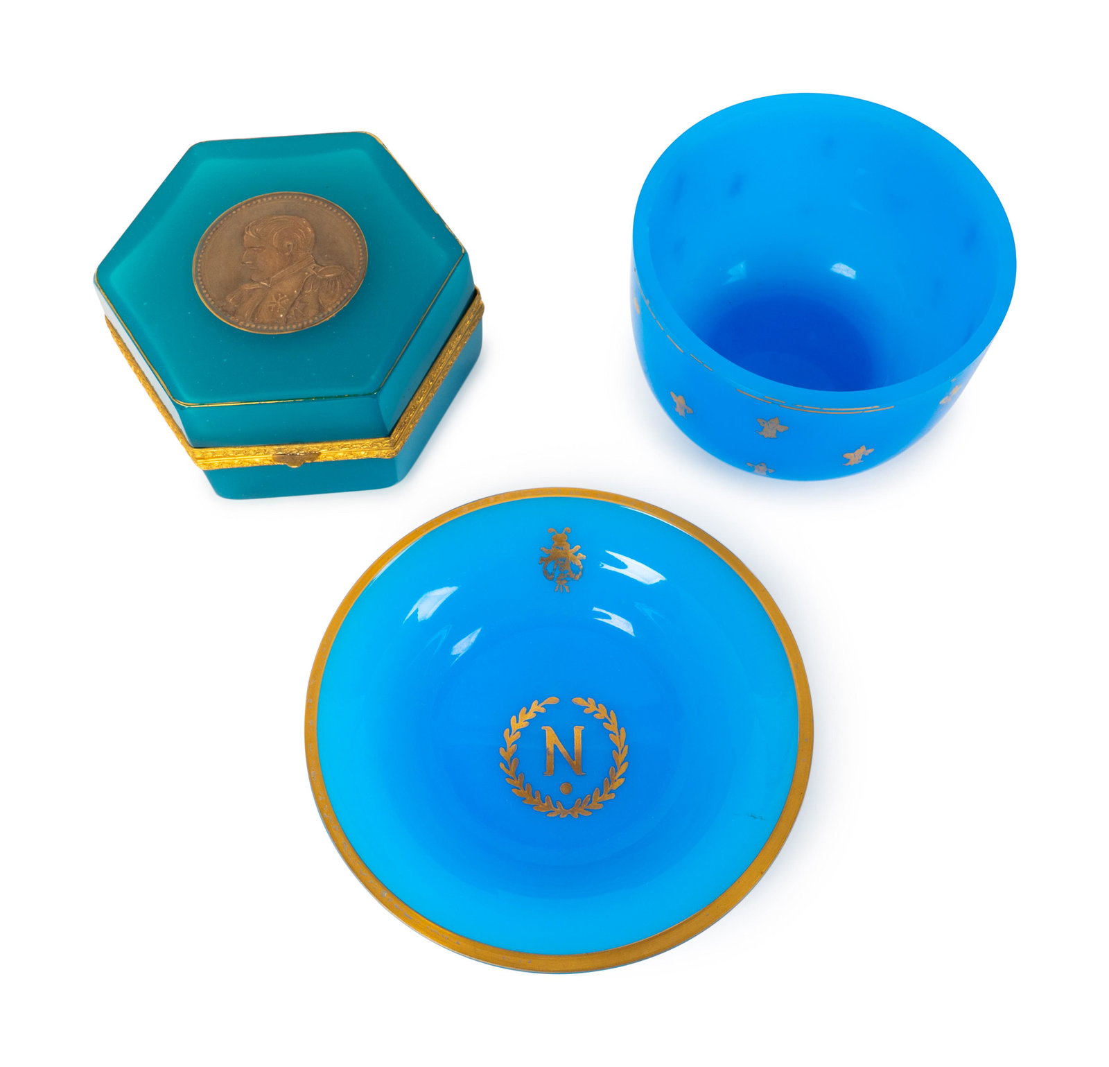 Three Napoleonic Blue Opaline Glass Articles Largest,: Three Napoleonic Blue Opaline Glass Articles 19TH CENTURY comprising a hexagonal gilt bronze mounted table casket, a bowl with bee-motif and a deep bowl with bee motif. Largest, Height 3 3/8 x d