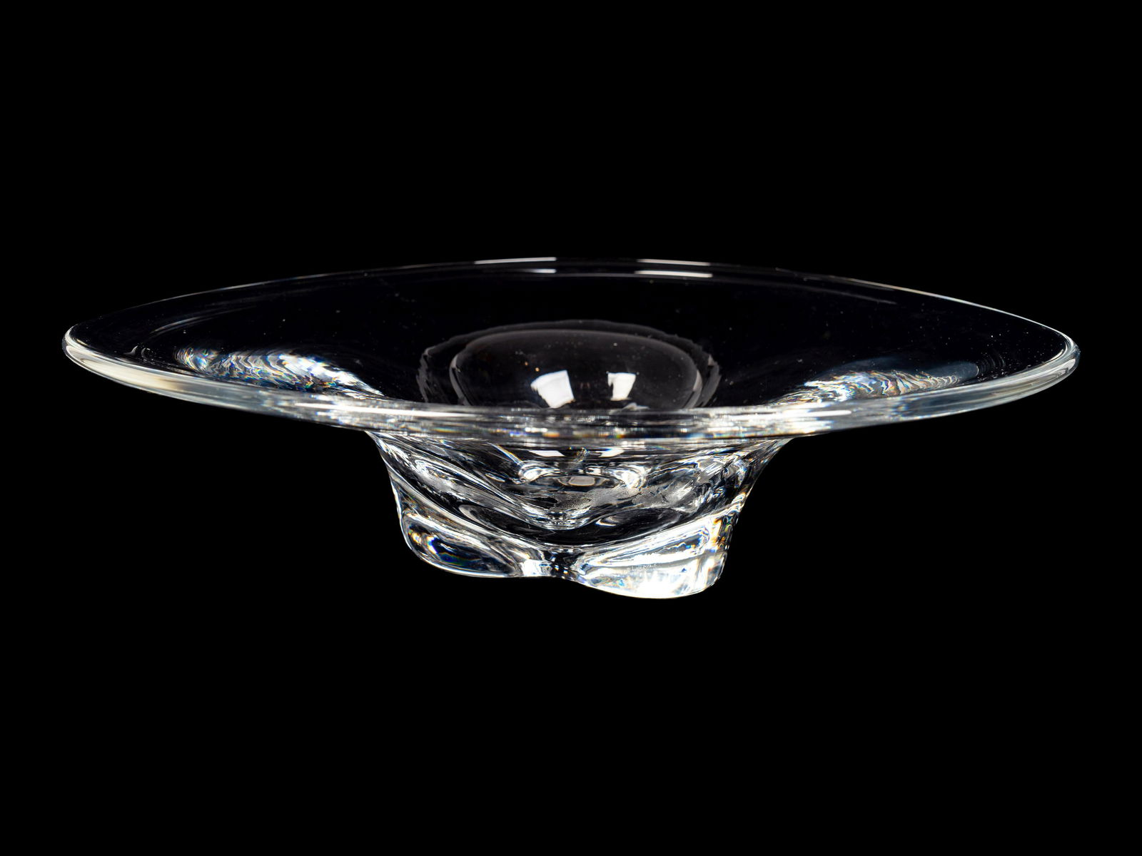 An Orrefors Glass Centerbowl Height 4 x diameter 13: An Orrefors Glass Centerbowl Of shaped circular form; inscribed Orrefors N3516 211. Height 4 x diameter 13 inches. Property of a Boca Raton Private Collector