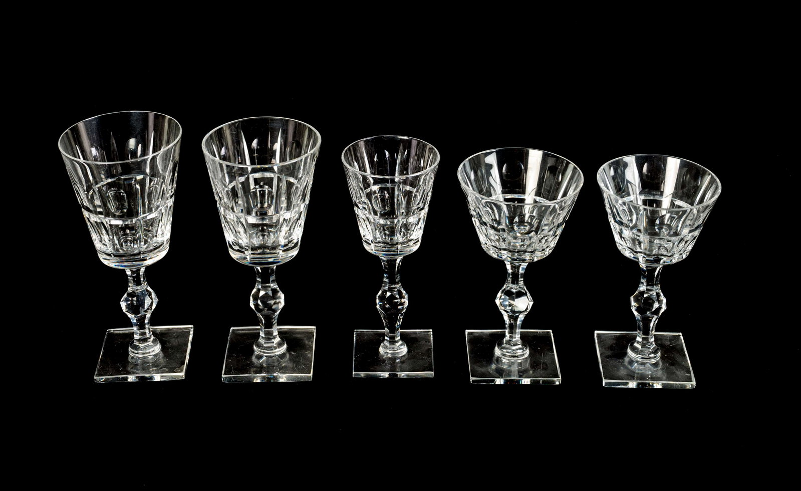 A Hawkes Cut-Glass Part Stemware Service Height of: A Hawkes Cut-Glass Part Stemware Service 20TH CENTURY comprising 7 water goblets, 8 champagnes and 8 wine glasses. Height of tallest, 7 1/2 inches. Property from a Palm Beach Collection