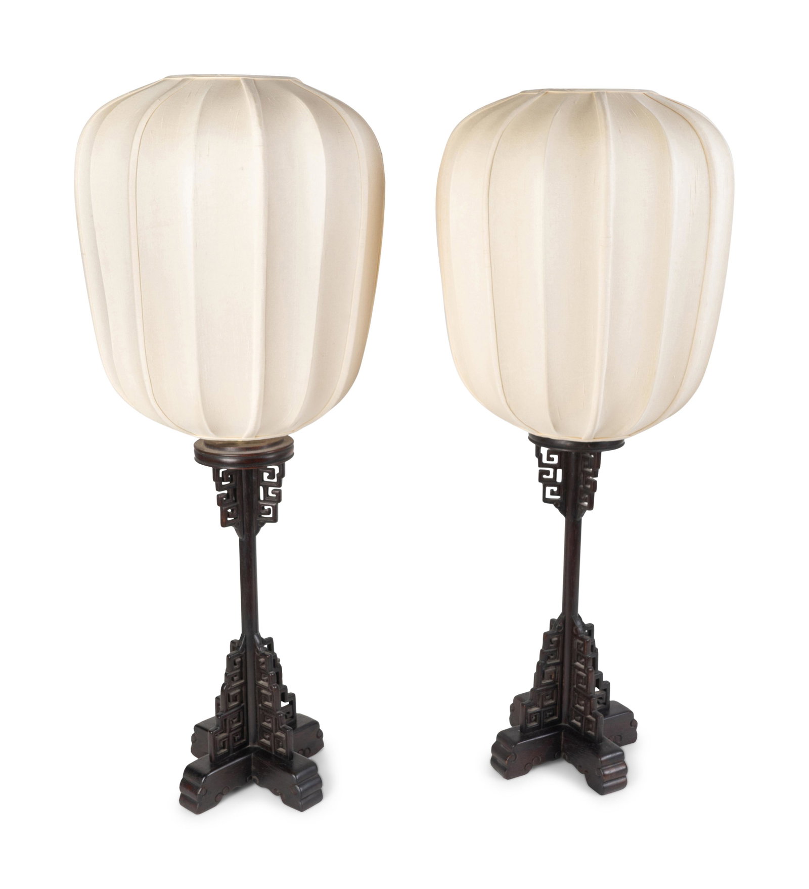 A Pair of Chinese Style Pierced and Ebonized Wood Table: A Pair of Chinese Style Pierced and Ebonized Wood Table Lamps Height 36 inches.