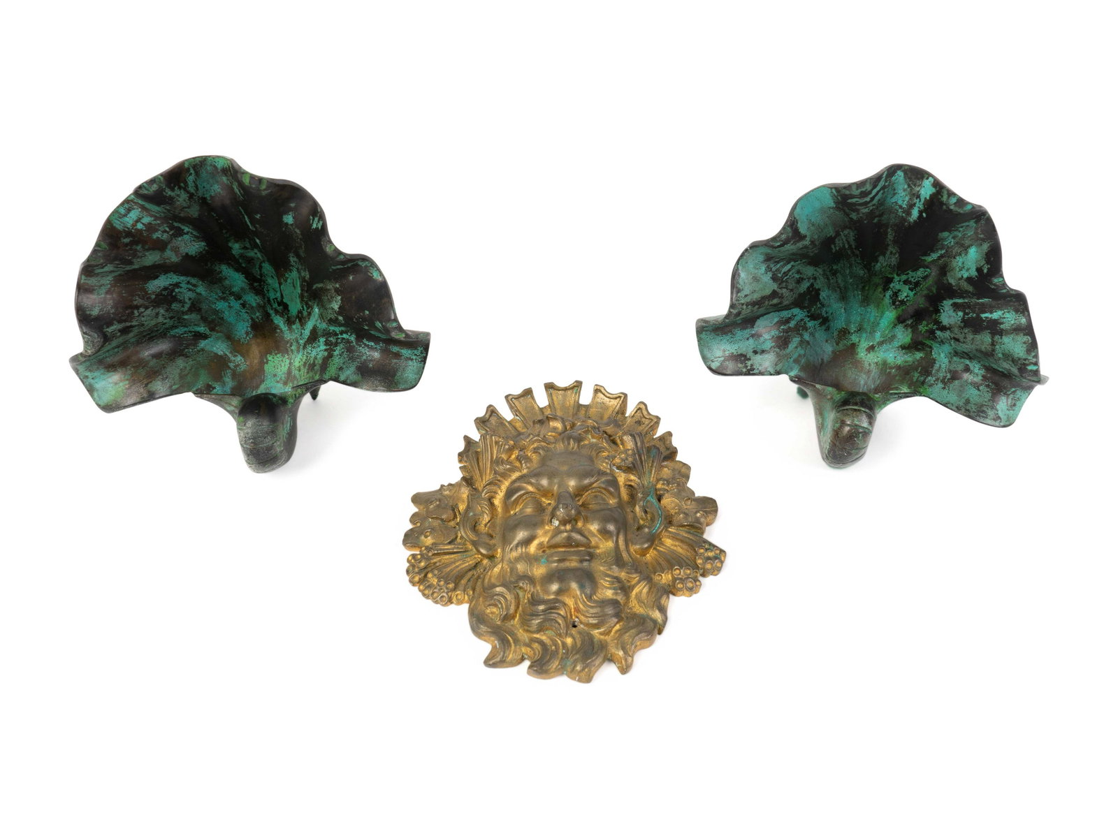 A Pair of Leaf-form Bronze Bookends and a Gilt Bronze: A Pair of Leaf-form Bronze Bookends and a Gilt Bronze Mask 20TH CENTURY Bookends, height 6 3/4 inches.
