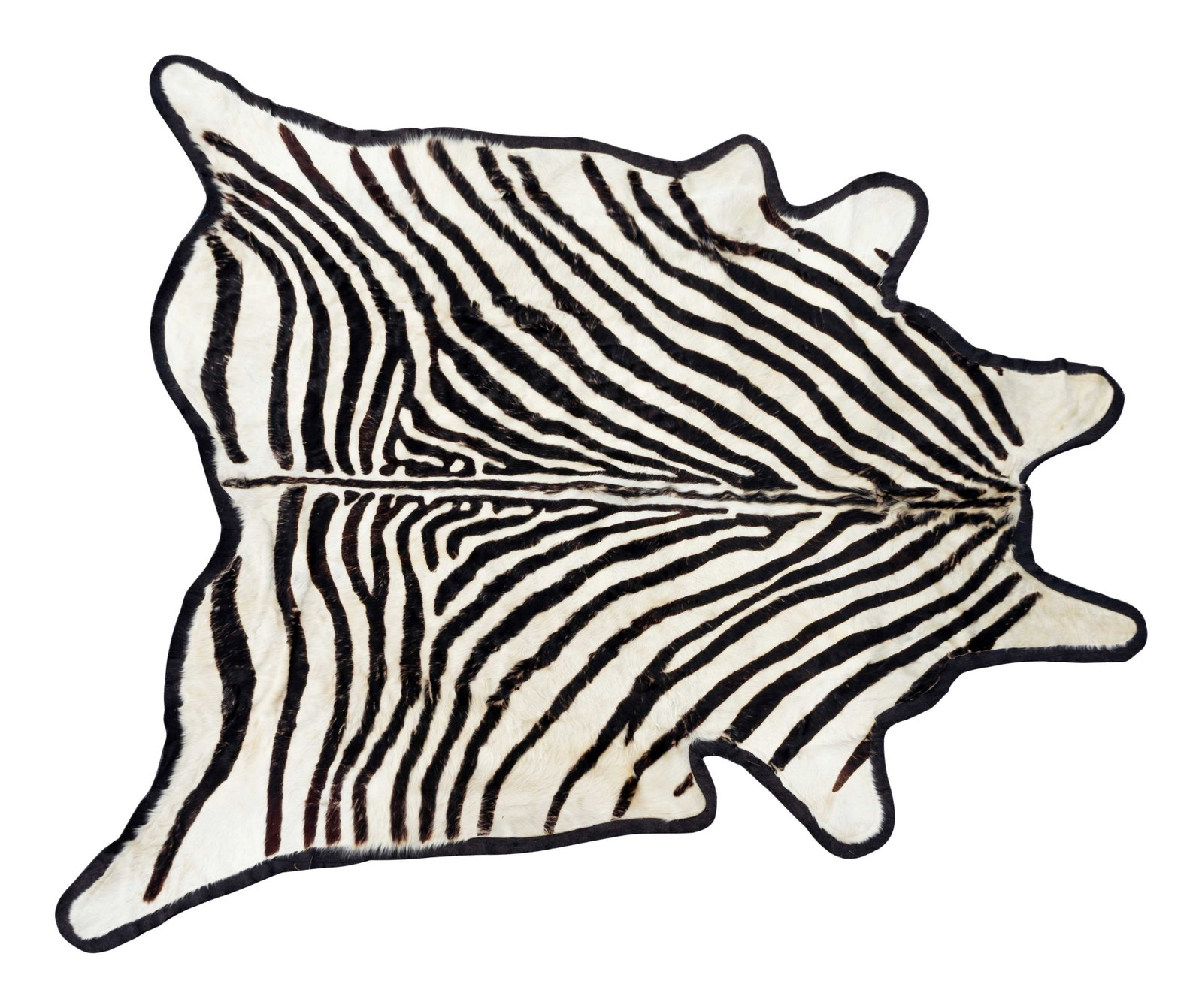 A Zebra Design Cow Hide Rug Length 96 x width 90: A Zebra Design Cow Hide Rug 20TH CENTURY Length 96 x width 90 inches.