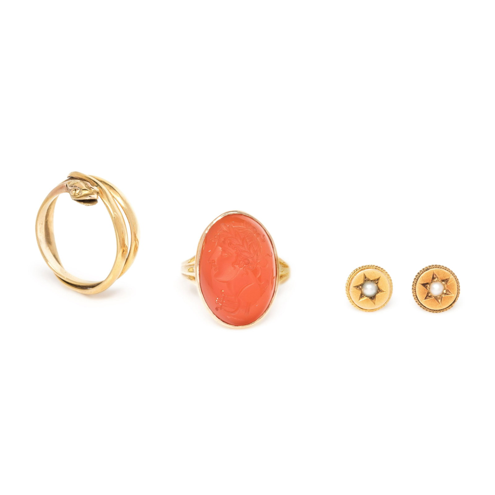 COLLECTION OF ANTIQUE JEWELRY: COLLECTION OF ANTIQUE JEWELRY Consisting of an 18 karat yellow gold snake ring, a 10 karat rose gold and carnelian intaglio ring depicting the profile of a man, together with a pair of 14 karat yellow