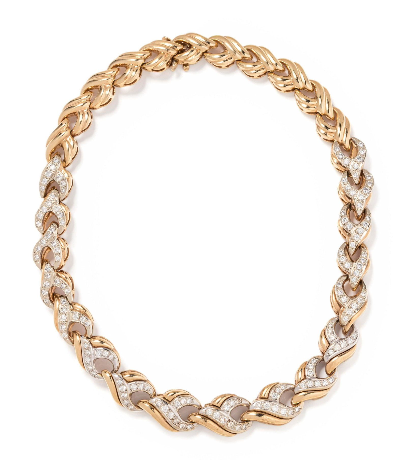 BICOLOR GOLD AND DIAMOND COLLAR NECKLACE: BICOLOR GOLD AND DIAMOND COLLAR NECKLACE Consisting of yellow gold links with white gold detail containing 136 round brilliant cut diamonds weighing approximately 3.50 carats total. 14 1/2 inches long