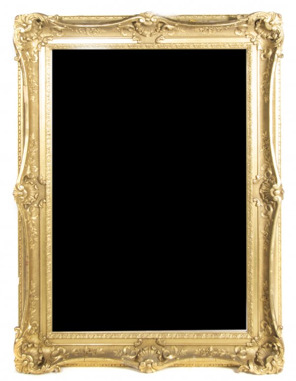 A Victorian Giltwood Pier Mirror, Height 57 x width 43 : A Victorian Giltwood Pier Mirror, having a rectangular plate within a foliate carved frame, with carved shells at the corners. Height 57 x width 43 inches.