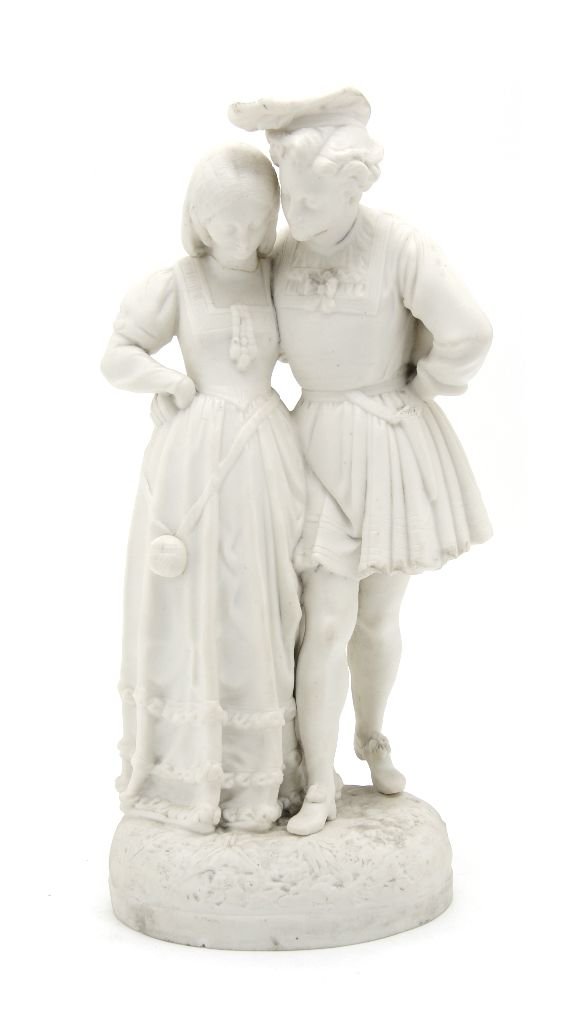 A Parianware Figural Group, Height 14 1/4 inches.