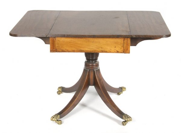 A Georgian Mahogany Sofa Table, Width of top 35 1/2 inc: A Georgian Mahogany Sofa Table, late 18th century, having a rectangular top with D-shaped leaves over a single drawer, raised on turned stem over four sabre legs terminating in brass paw caps with cas