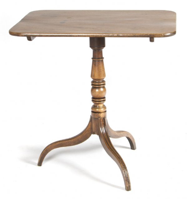 A Georgian Style Mahogany Tilt-Top Table, Height 27 3/4: A Georgian Style Mahogany Tilt-Top Table, having a rectangular top over a turned standard, raised on a tripod base. Height 27 3/4 x width 21 1/8 x depth 28 inches.