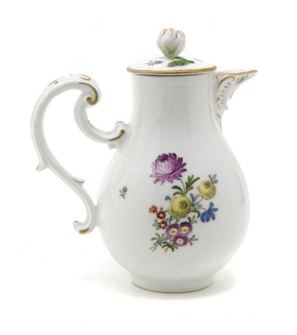 A Meissen Diminutive Teapot, Height 6 1/4 inches.: A Meissen Diminutive Teapot, having gilt and floral decoration, bearing crossed swords mark in underglaze blue. Height 6 1/4 inches.