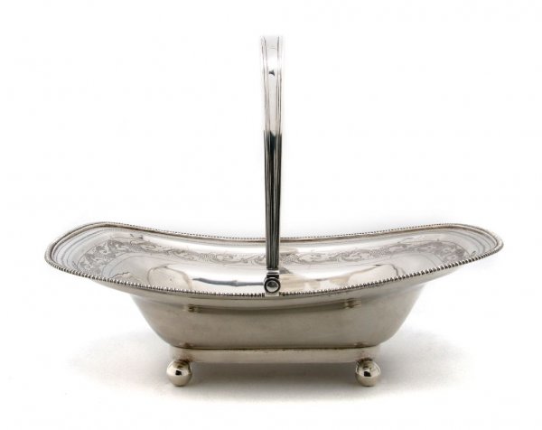 A George III Silver Basket, Width 12 1/2 inches.: A George III Silver Basket, Newcastle 1810, having bead form border around interior foliate and grape motif, the interior of the well inscribed 'RM to MR,' made by Anne Robertson; approximate weight 2