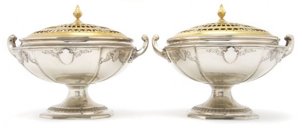 A Pair of Lidded Sterling Silver Potpourris, Frank: A Pair of Lidded Sterling Silver Potpourris, Frank W. Smith Silver Co., having pierced brass lid with the compressed form flanked by handles; approximate weight 51.40 ozt. Width over handles 11 inches