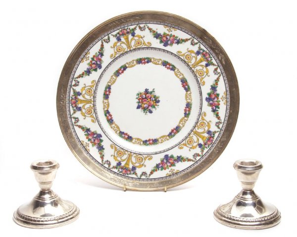 A Pair of American Sterling Silver Candlesticks, O: A Pair of American Sterling Silver Candlesticks, Otto Reichardt, weighted, together with a sterling mounted Wedgwood tray. Height of first 3 1/4 inches.