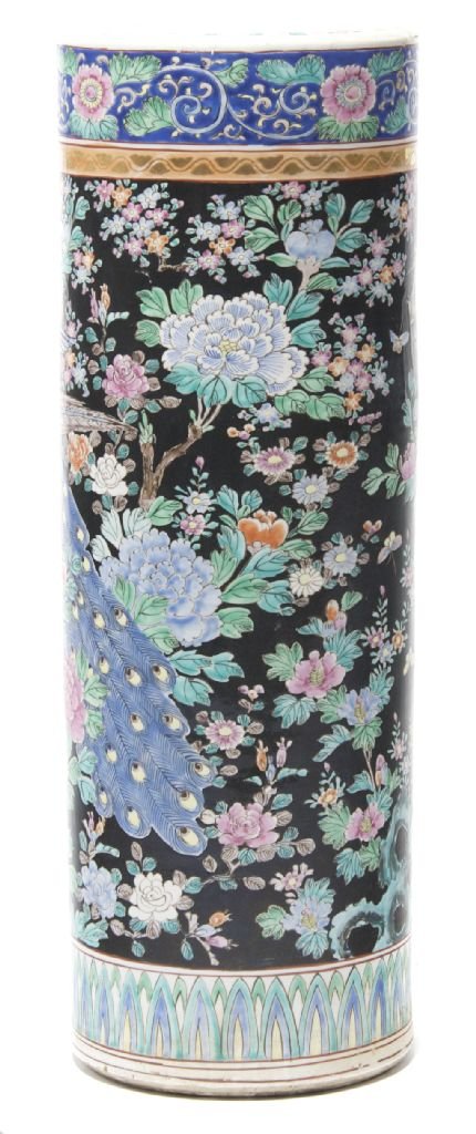 A Chinese Ceramic Umbrella Stand, Height 23 1/2 in: A Chinese Ceramic Umbrella Stand, of typical cylindrical form, having polychrome decoration depicting birds on flowering branches, unmarked. Height 23 1/2 inches