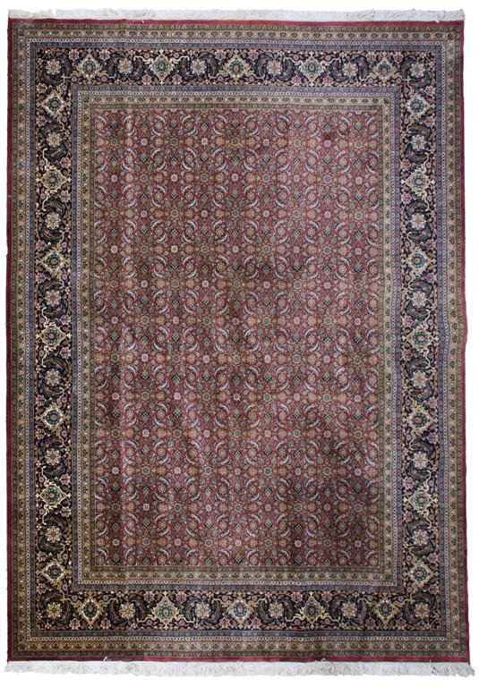 An Indo-Kashan Carpet, Approximately 11 feet 10 in