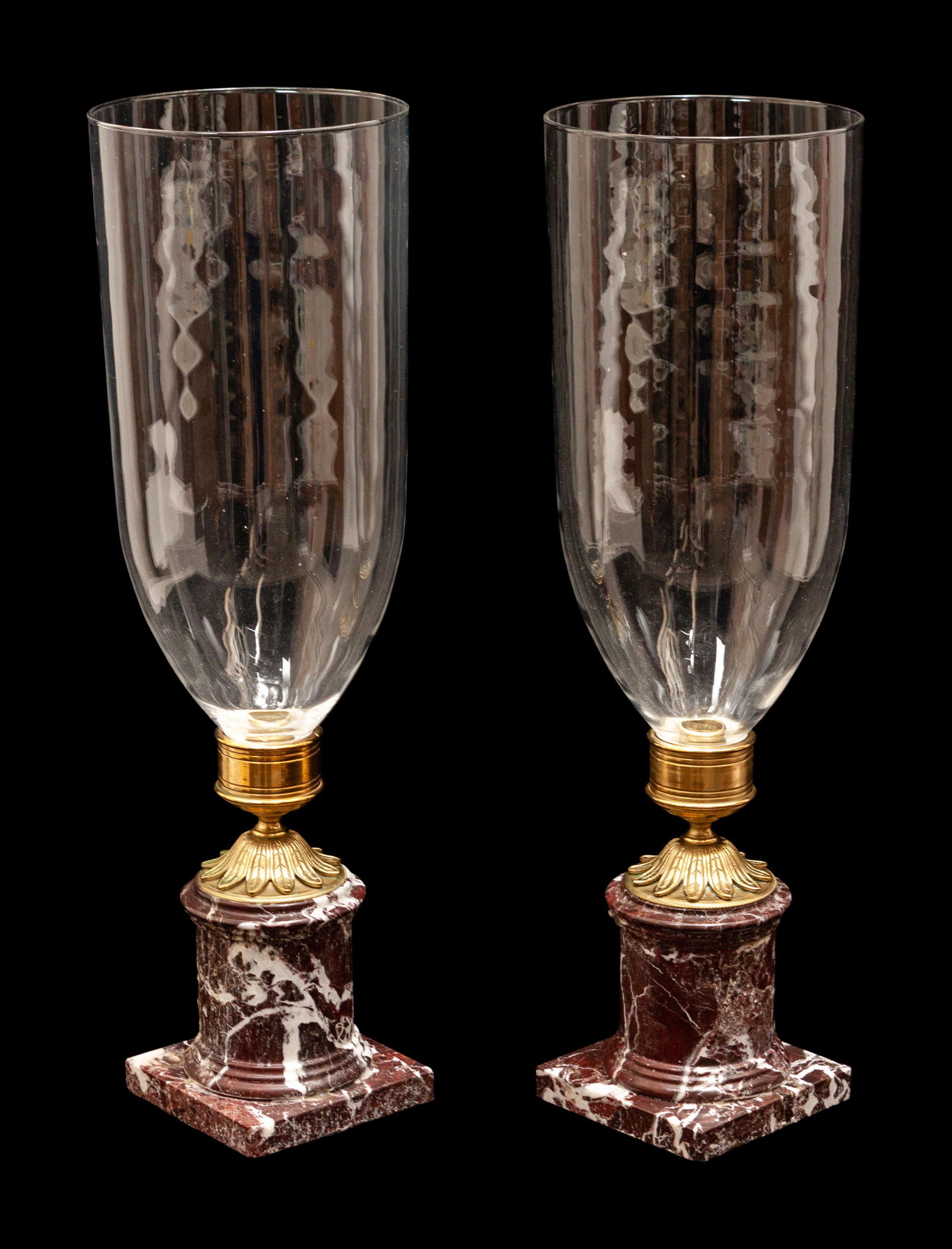 A Pair of French Gilt Metal and Marble Mounted: A Pair of French Gilt Metal and Marble Mounted Photophores Late 19th/Early 20th Century Height 19 1/2 inches. Property from the Collection of Tina and Simon Beriro, Aspen, Colorado