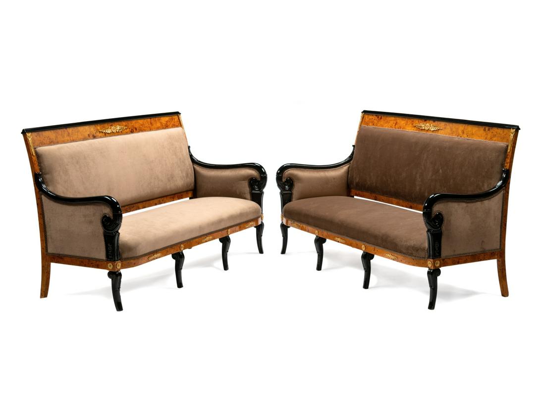 A Pair of Directoire Style Parcel Ebonized Burlwood: A Pair of Directoire Style Parcel Ebonized Burlwood Settees 20th Century Height 38 x width 70 1/2 x depth 24 inches.