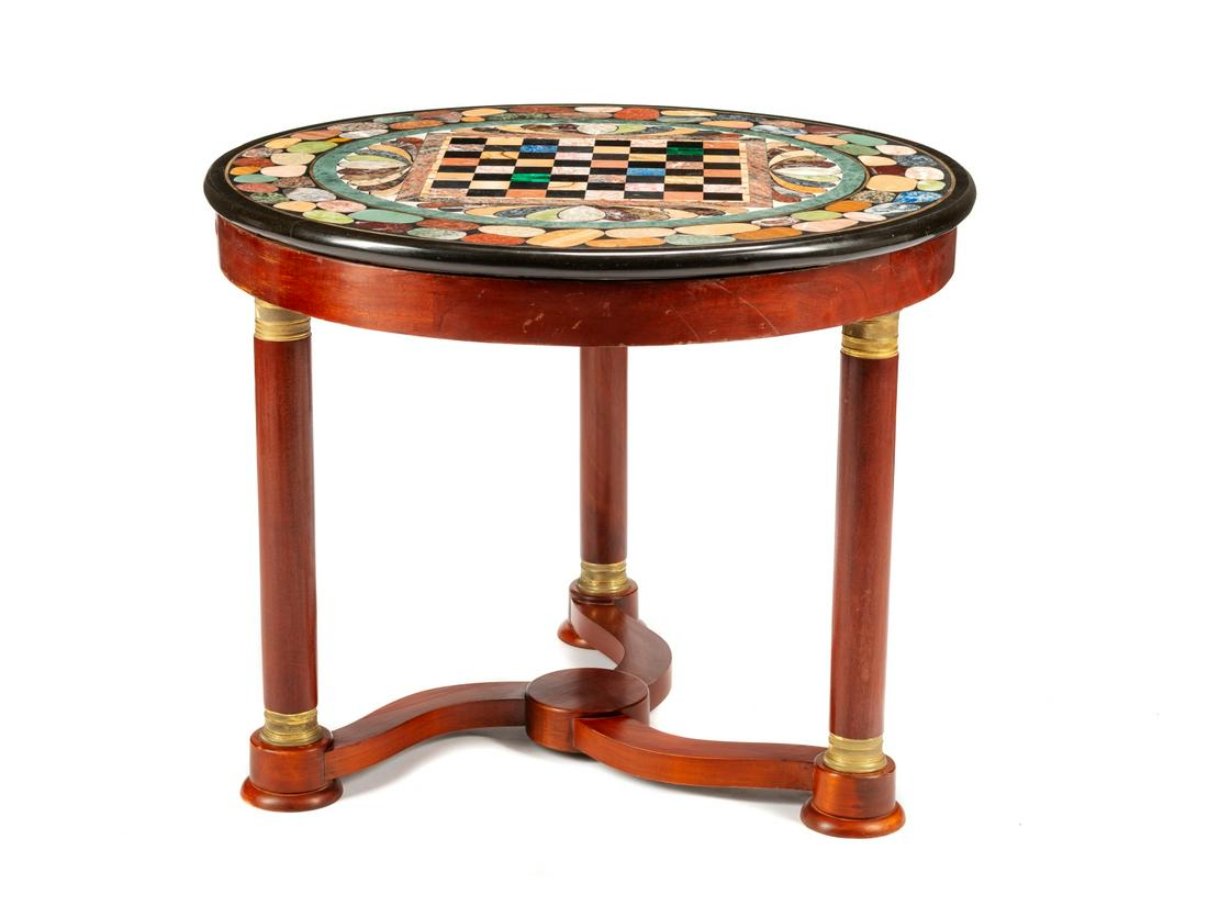 An Empire Style Gilt Bronze Mounted Mahogany Gueridon: An Empire Style Gilt Bronze Mounted Mahogany Gueridon with a Specimen Marble Top 20th Century Height 29 x diameter of top 36 inches.