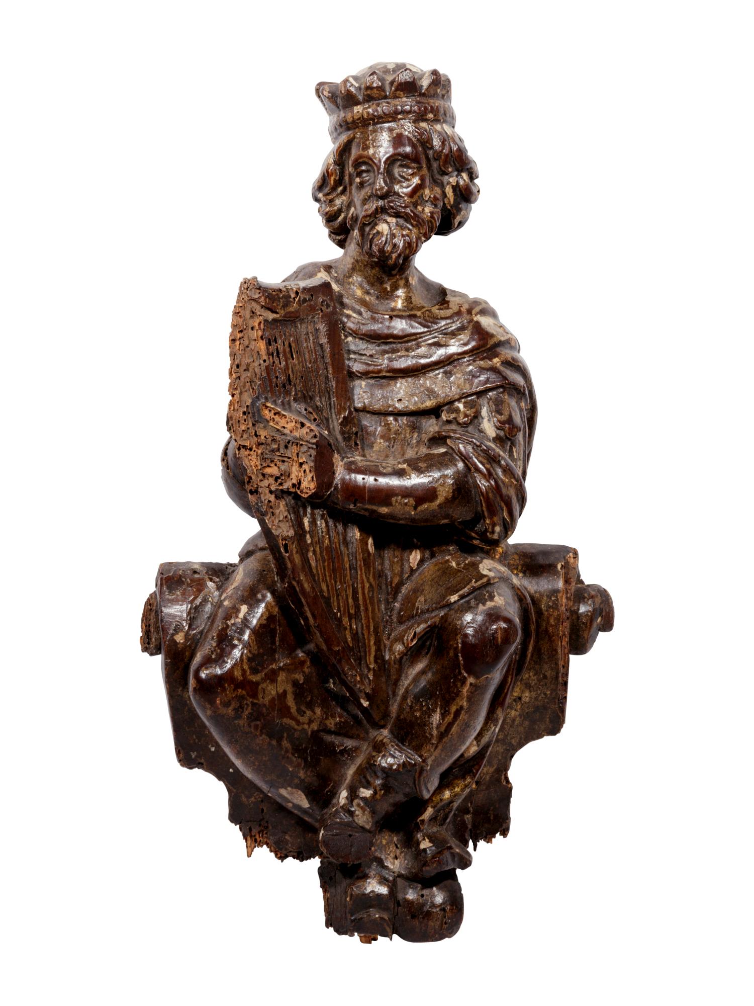 A Continental Carved and Painted Figure of King David: A Continental Carved and Painted Figure of King David Playing the Harp 17th/18th Century Height 23 x width 11 inches. Property from a Chicago Collector