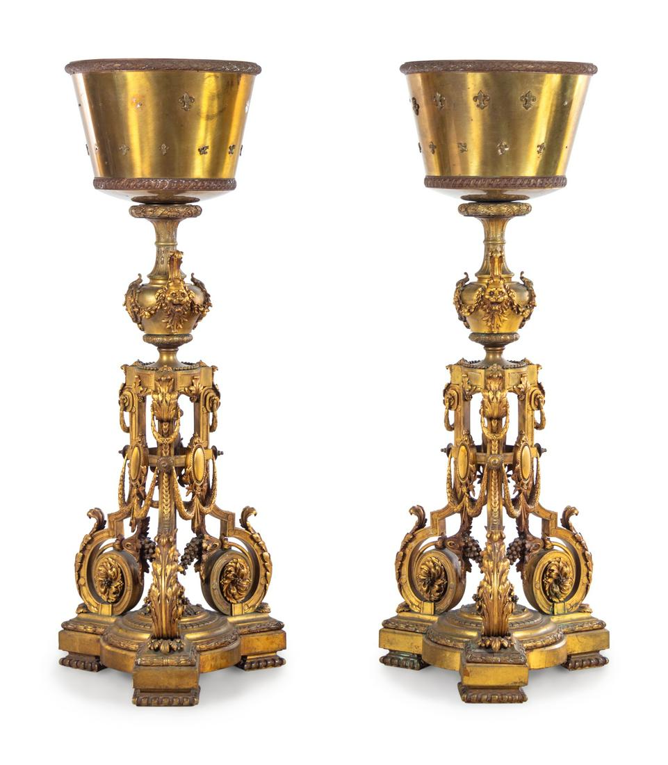 A Pair of Neoclassical Gilt Bronze Pedestals: A Pair of Neoclassical Gilt Bronze Pedestals 19th Century Height 62 inches. Property from Lawry's The Prime Rib, located in the historic L. Hamilton McCormick Mansion, Chicago, Illinois, offered witho