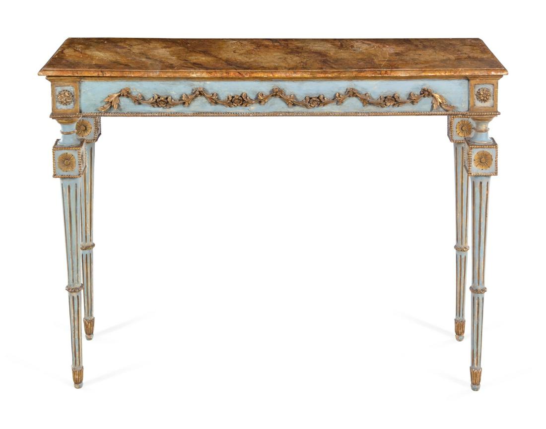 An Italian Carved, Painted and Parcel Gilt Faux: An Italian Carved, Painted and Parcel Gilt Faux Marble-Top Console Table 18th Century Height 34 x width 47 x depth 16 1/2 inches.