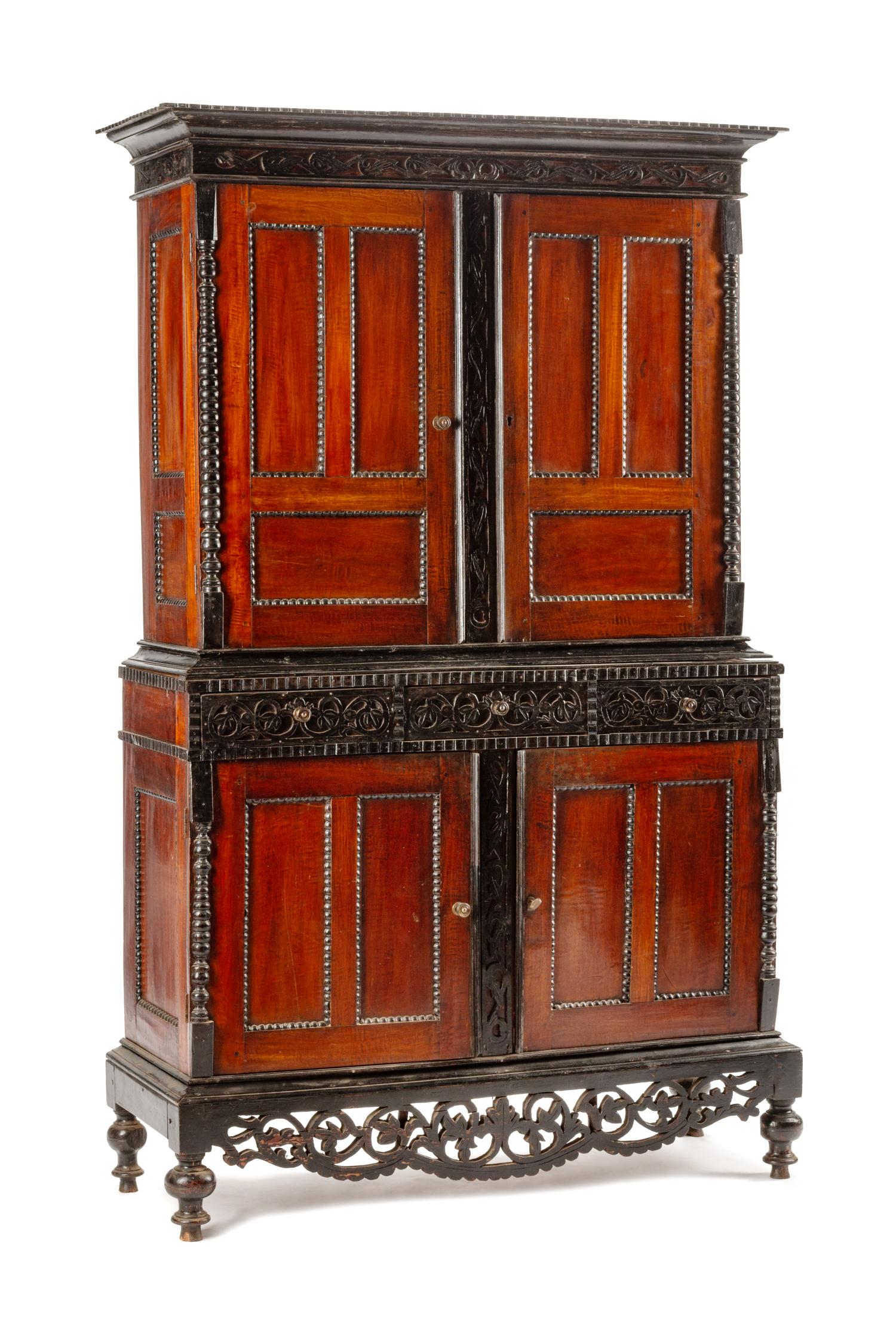 A Dutch Colonial Parcel Ebonized Mahogany Cabinet: A Dutch Colonial Parcel Ebonized Mahogany Cabinet 19th Century Height 80 x width 50 x depth 18 1/2 inches.
