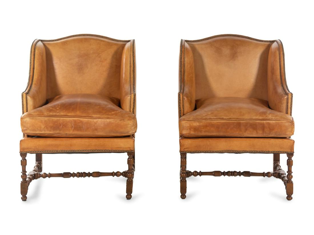 A Pair of William and Mary Style Leather-Upholstered: A Pair of William and Mary Style Leather-Upholstered Wingback Armchairs 20th Century Height 39 1/2 x width 29 x depth 27 1/2 inches. Property of an Aspen, Colorado Area Private Collector