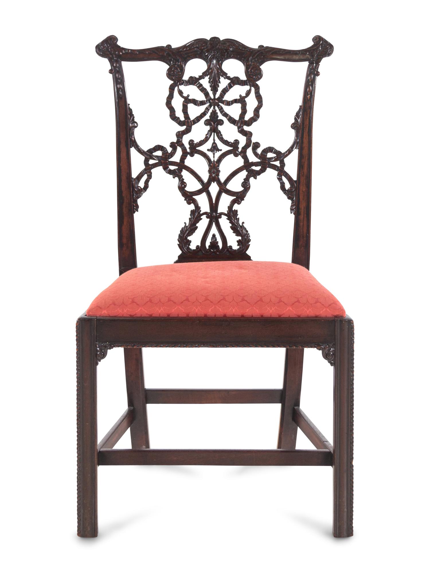 A George III Carved Mahogany Ribbon-Back Side Chair: A George III Carved Mahogany Ribbon-Back Side Chair after a Design by Thomas Chippendale Circa 1770 Height 38 1/4 inches. Property from the Collection of Mary Southworth, Lake Forest, Illinois