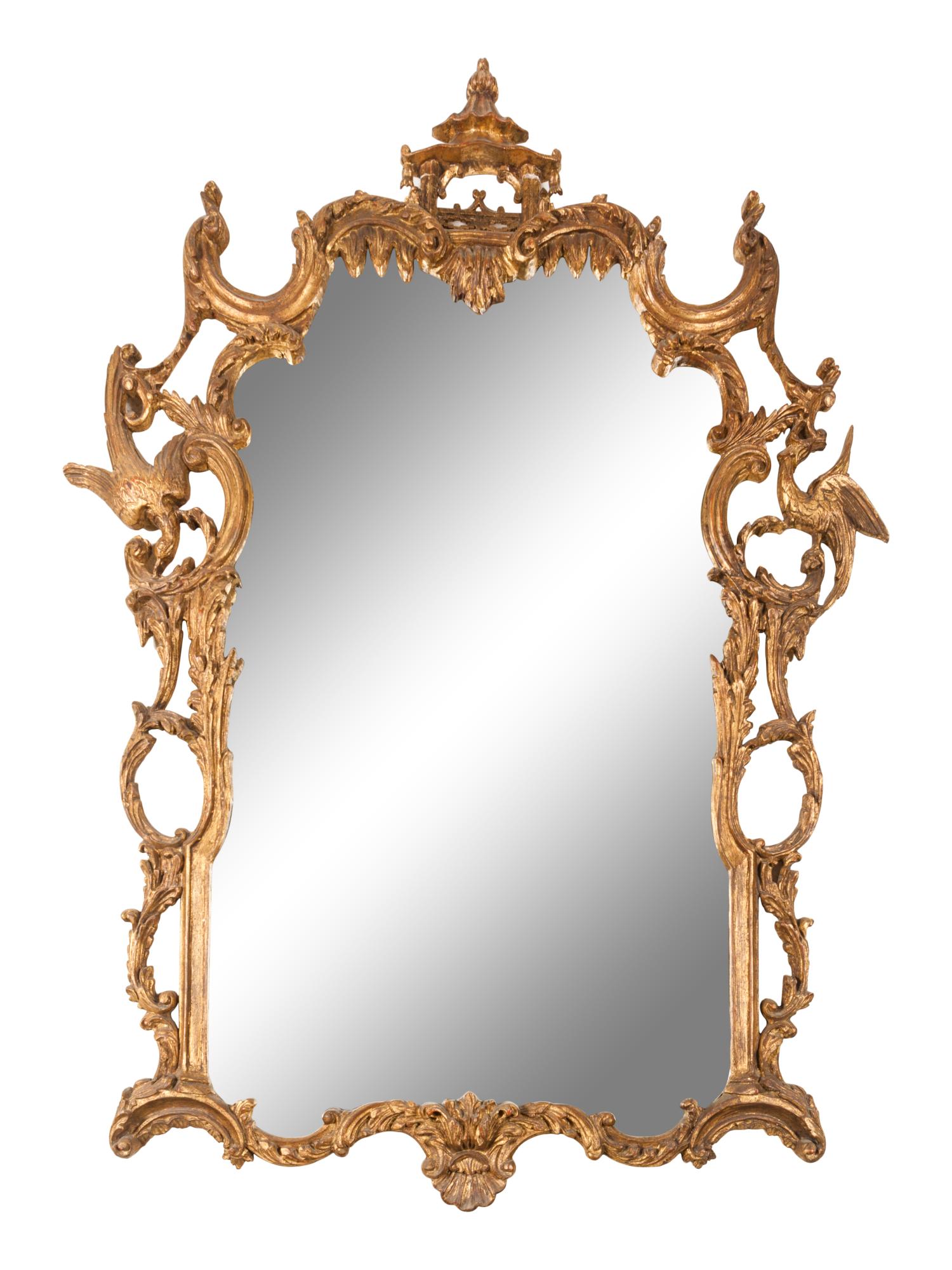 A Chinese Chippendale Style Giltwood Looking Glass: A Chinese Chippendale Style Giltwood Looking Glass 20th Century Height 54 x width 42 inches.