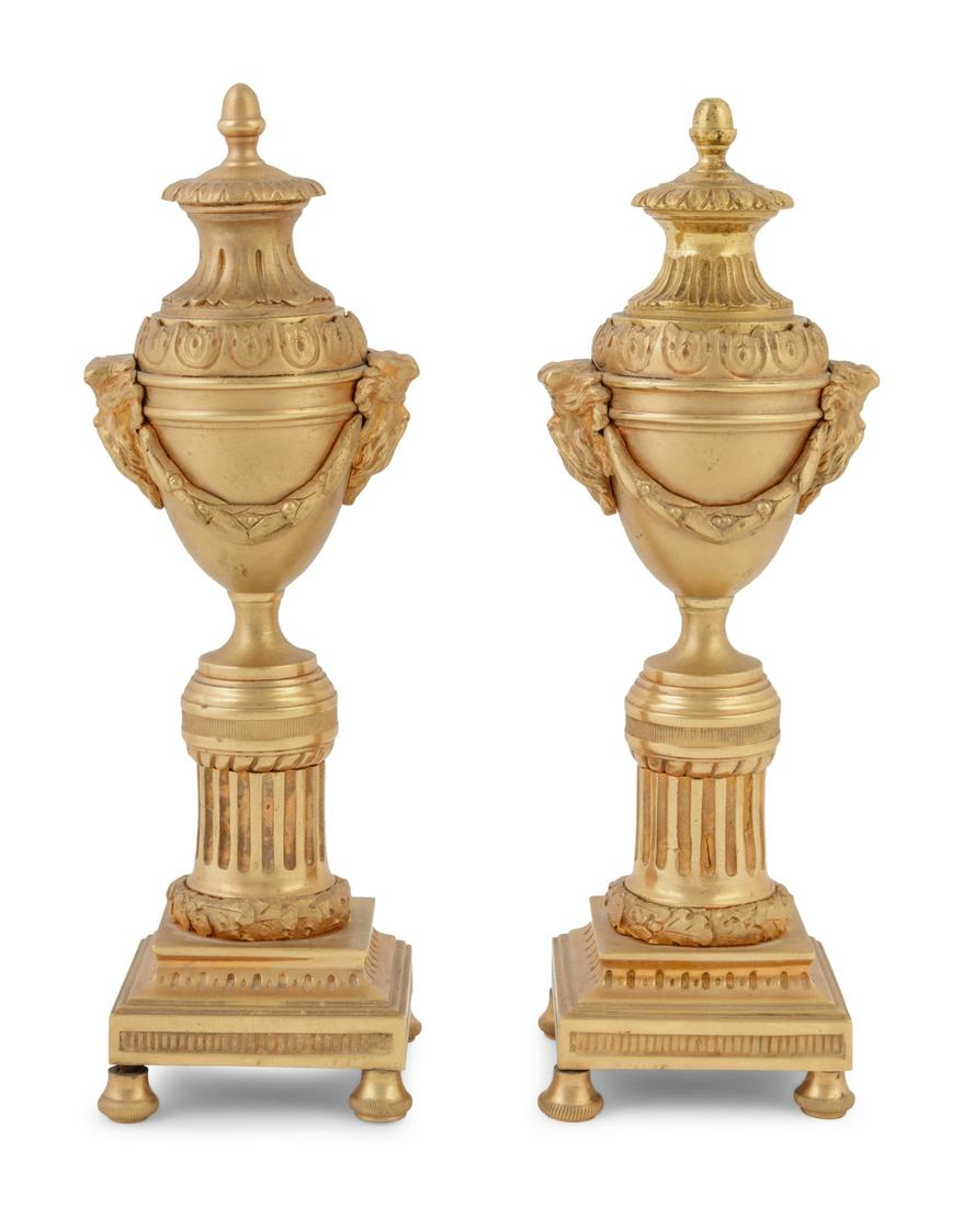 A Pair of English Gilt Bronze Cassolettes in the Style: A Pair of English Gilt Bronze Cassolettes in the Style of Matthew Boulton 19th Century Height 8 5/8 inches. Property from the Collection of Steven Huffines, San Francisco, California