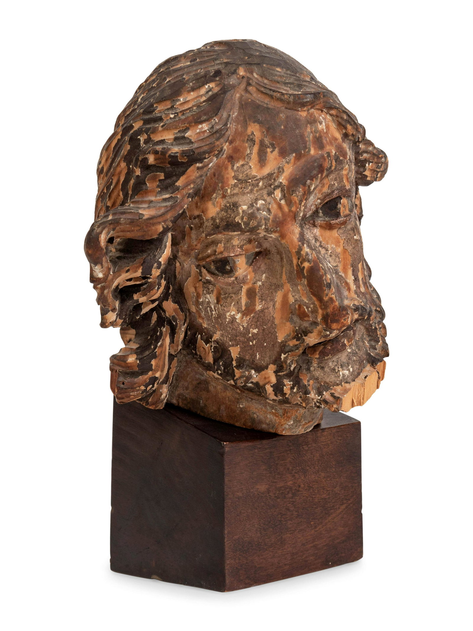 A Continental Carved and Polychromed Bust of a Saint: A Continental Carved and Polychromed Bust of a Saint 18th Century or Earlier Height 10 inches. Property from the Collection of William and Sharon Treul, Pewaukee, Wisconsin
