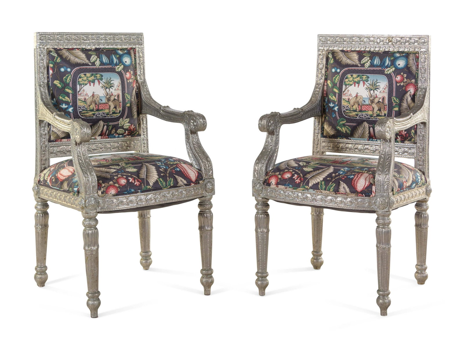 A Pair of Indian Silvered Armchairs: A Pair of Indian Silvered Armchairs 20th Century Height 42 x width 22 x depth 21 1/2 inches.