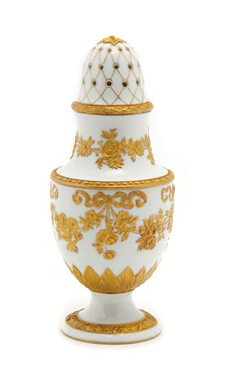 A (K.P.M.) Porcelain Caster, Height 6 3/4 inches.: A (K.P.M.) Porcelain Caster, having gilt ribbon and scrolling foliate decoration throughout. Height 6 3/4 inches.