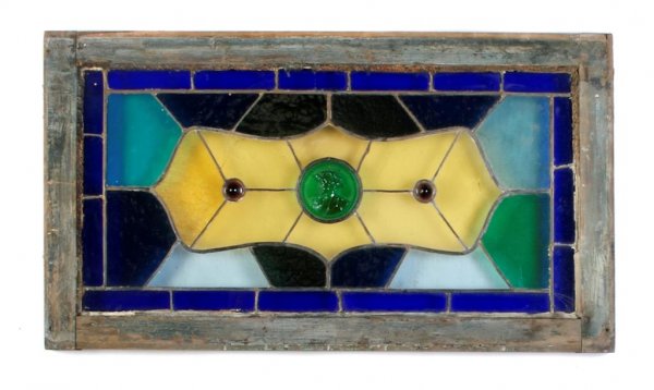 A Leaded Glass Window, Height 13 1/4 x width 27 1/2 inc: A Leaded Glass Window, centered with a portrait medallion. Height 13 1/4 x width 27 1/2 inches.