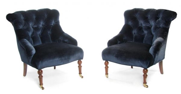 A Pair of American Slipper Chairs, Height 34 inches.: A Pair of American Slipper Chairs, having upholsterd backs, arms and seats raised on ring turned legs ending in casters. Height 34 inches.