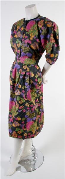 An Yves Saint Laurent Floral Print Silk Ensemble, : An Yves Saint Laurent Floral Print Silk Ensemble, 1980s, blouse with puff sleeves, full skirt. Labeled: Saint Laurent. Size 40.