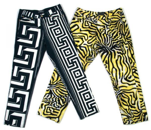 Two Pairs of Gianni Versace Psycadellic Print Pant: Two Pairs of Gianni Versace Psycadellic Print Pants. one in a yellow zebra print and one in a navy and white geometric print. Labeled: Various Versace Labels. Size 40/54 and 38/52.