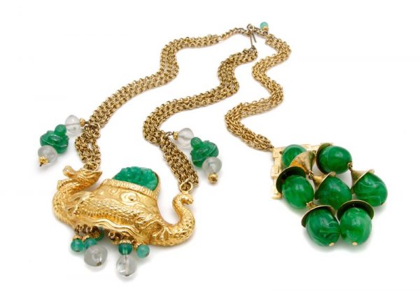 A Trifari Goldtone Dragon and Buddha Necklace,: A Trifari Goldtone Dragon and Buddha Necklace, 1970s, with faux jade throughout. Stamped: Trifari.
