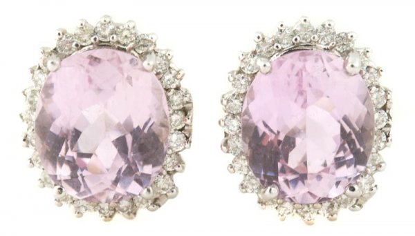 A Pair of 14 Karat White Gold, Kunzite and Diamond Earr: A Pair of 14 Karat White Gold, Kunzite and Diamond Earrings, containing two oval kunzites weighing approximately 17.50 carats total and numerous round brilliant cut diamonds weighing approximately 0.7