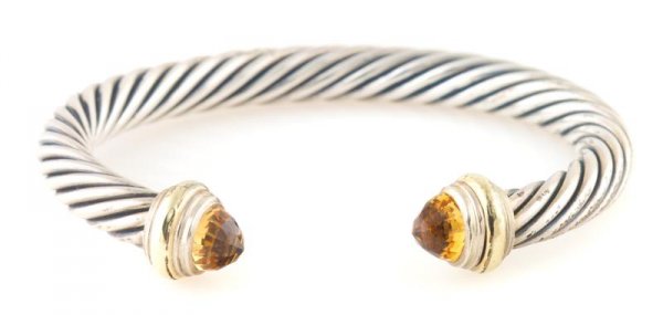 A Sterling Silver, 14 Karat Yellow Gold and Citrine Cuf: A Sterling Silver, 14 Karat Yellow Gold and Citrine Cuff Bracelet, David Yurman. 27.42 dwts.