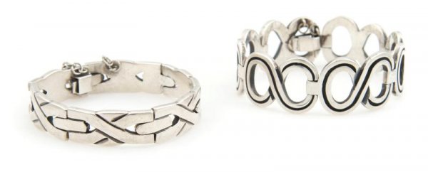 A Group of Two Sterling Silver Bracelets,: A Group of Two Sterling Silver Bracelets, the first in a weave design, stamp: STERLING 925 MEXICO Maricela TASCO; the second with a circular design, stamp: 925 MEXICO STERLING JJ TAXCO.