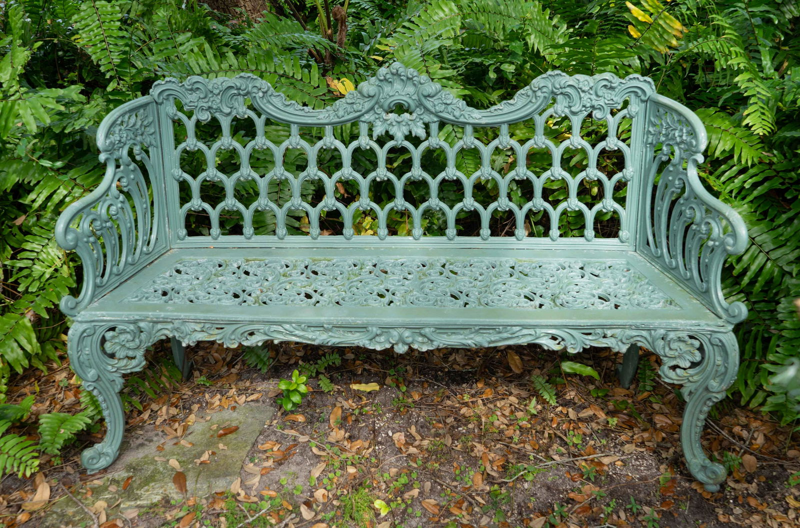 A Green-Painted Cast-Iron Garden Bench and Pair of (1 of 4)