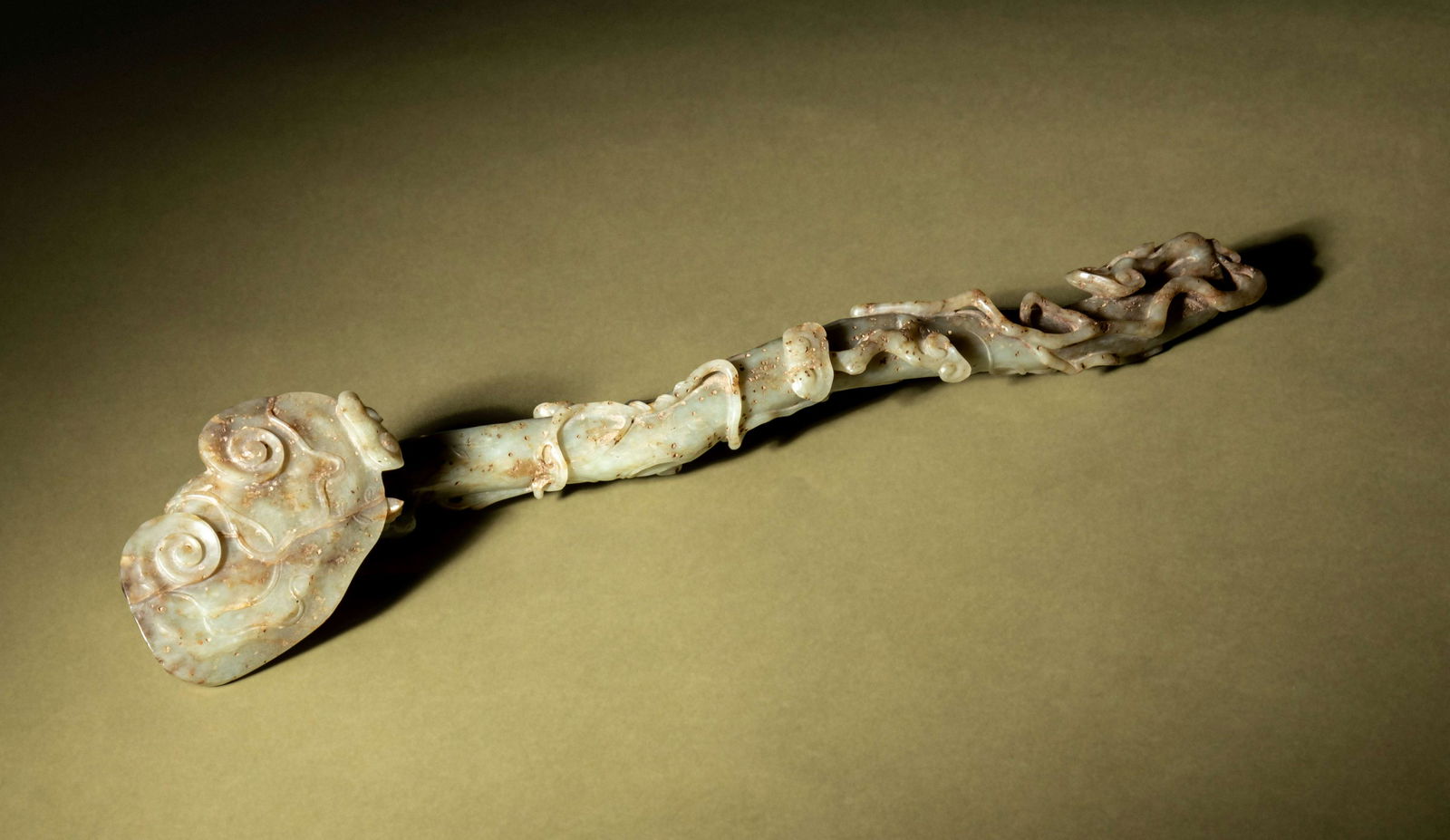 A Celadon and Grey Jade Ruyi Scepter (1 of 2)