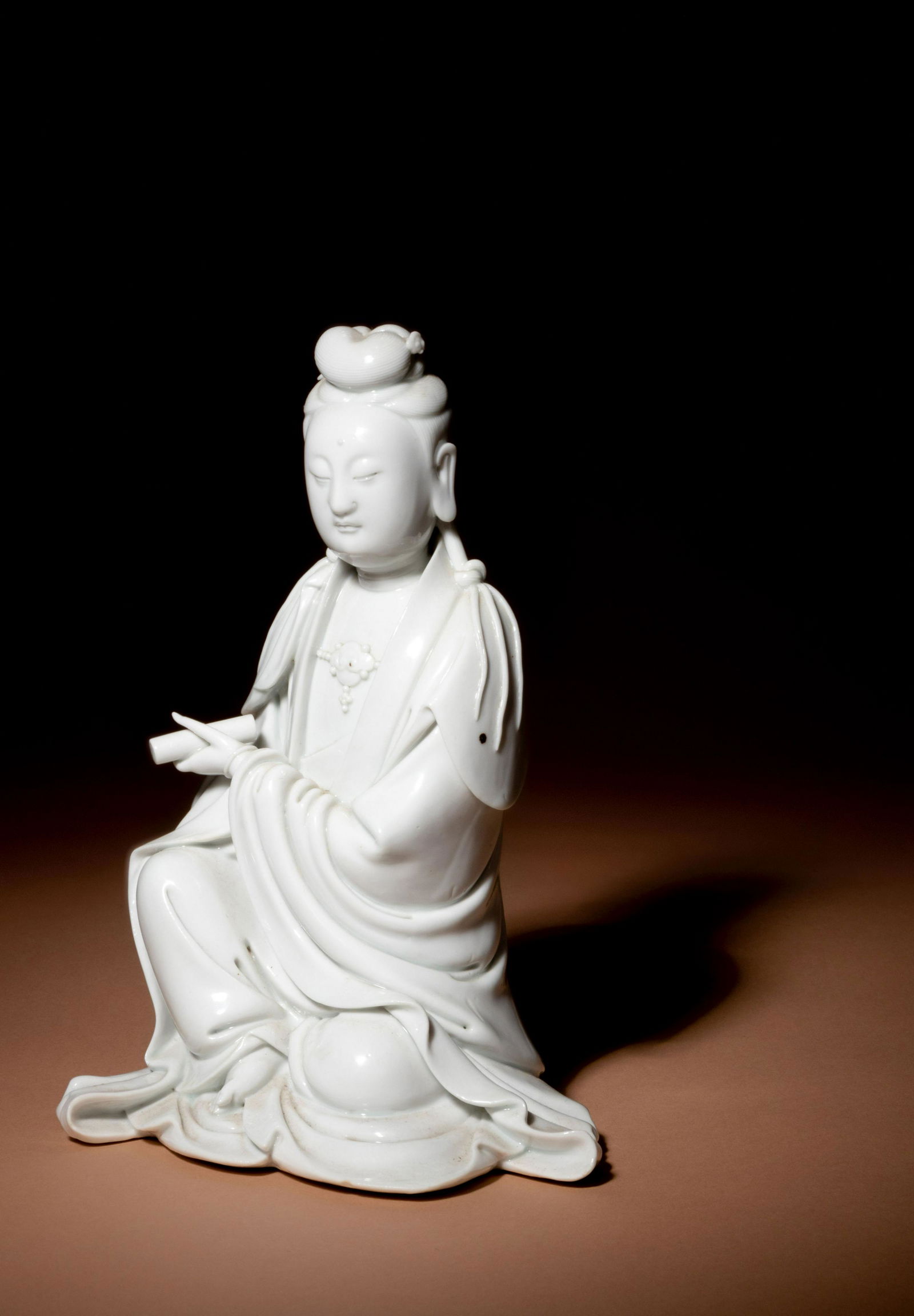 A Blanc-de-Chine Porcelain Figure of Guanyin (1 of 3)