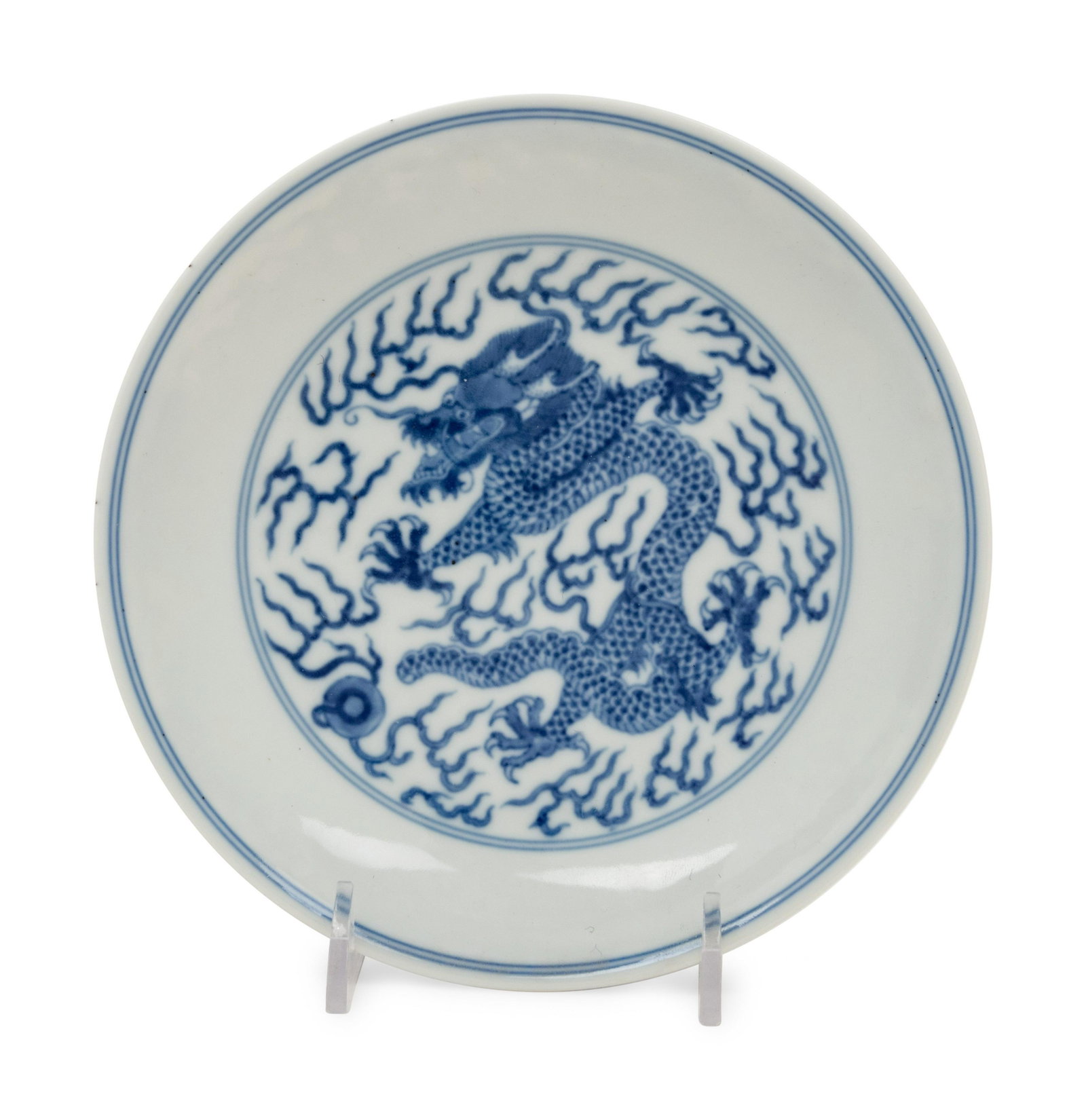 A Blue and White Porcelain 'Dragon' Dish: A Blue and White Porcelain 'Dragon' Dish DAOGUANG MARK 道光款 青花龍戲珠紋賞盤 having low angular walls curving to a slightly everted 