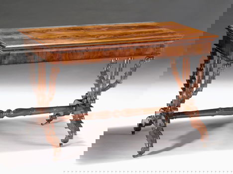 William IV mahogany library table, ca. 1835, The mo: William IV mahogany library table ca. 1835 The molded top over one frieze drawer, raised on carved X-form end supports united by a turned stretcher. H: 30, W: 45 1/2, D: 26 1/2 in.