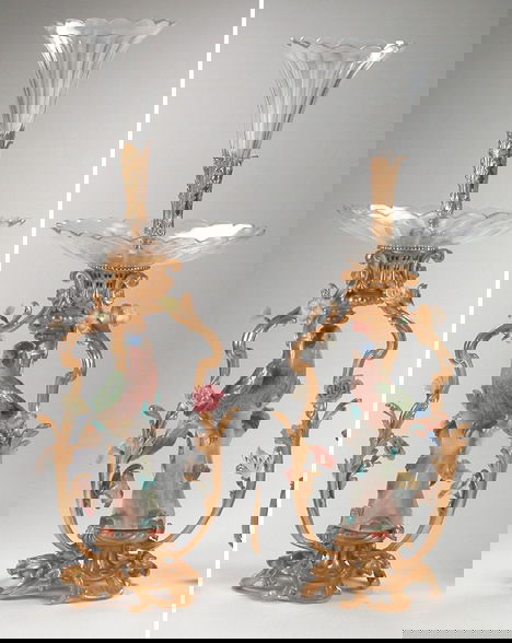 PAIR OF LOUIS XV-STYLE, PORCELAIN-MOUNTED, GILT-BR: PAIR OF LOUIS XV-STYLE, PORCELAIN-MOUNTED, GILT-BRONZE EPERGNES The flared vase surmounts and lobed bowls raised on three flower-encrusted flower supports centered by brightly colored birds raised on