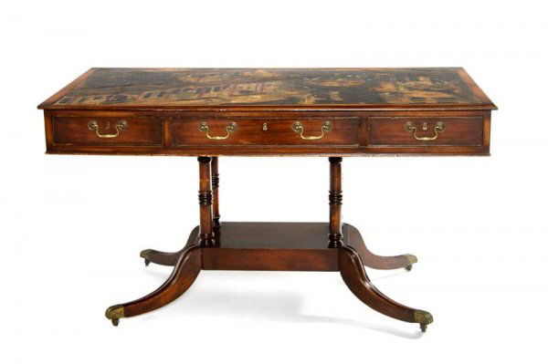 An English Mahogany Pedestal Table, Height 29 x wi: An English Mahogany Pedestal Table, having inset Chinese lacquer top above three drawers with brass handles, raised upon a rectangular base ending in four carved legs. Height 29 x width 52 1/2 x depth
