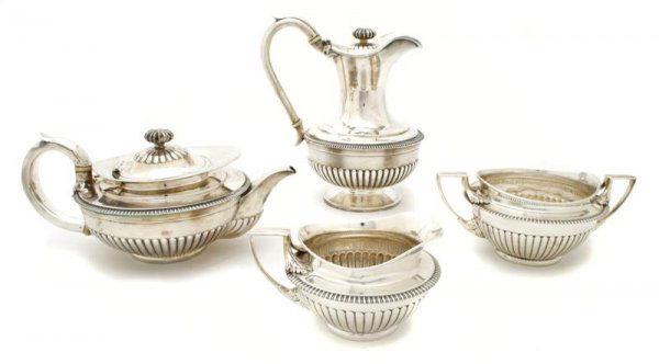 An English Silver Partial Coffee and Tea Service,: An English Silver Partial Coffee and Tea Service, London, 19th century, various makers, comprising water and tea kettles having ivory insulators, double handled sugar and a creamer; approximate weight